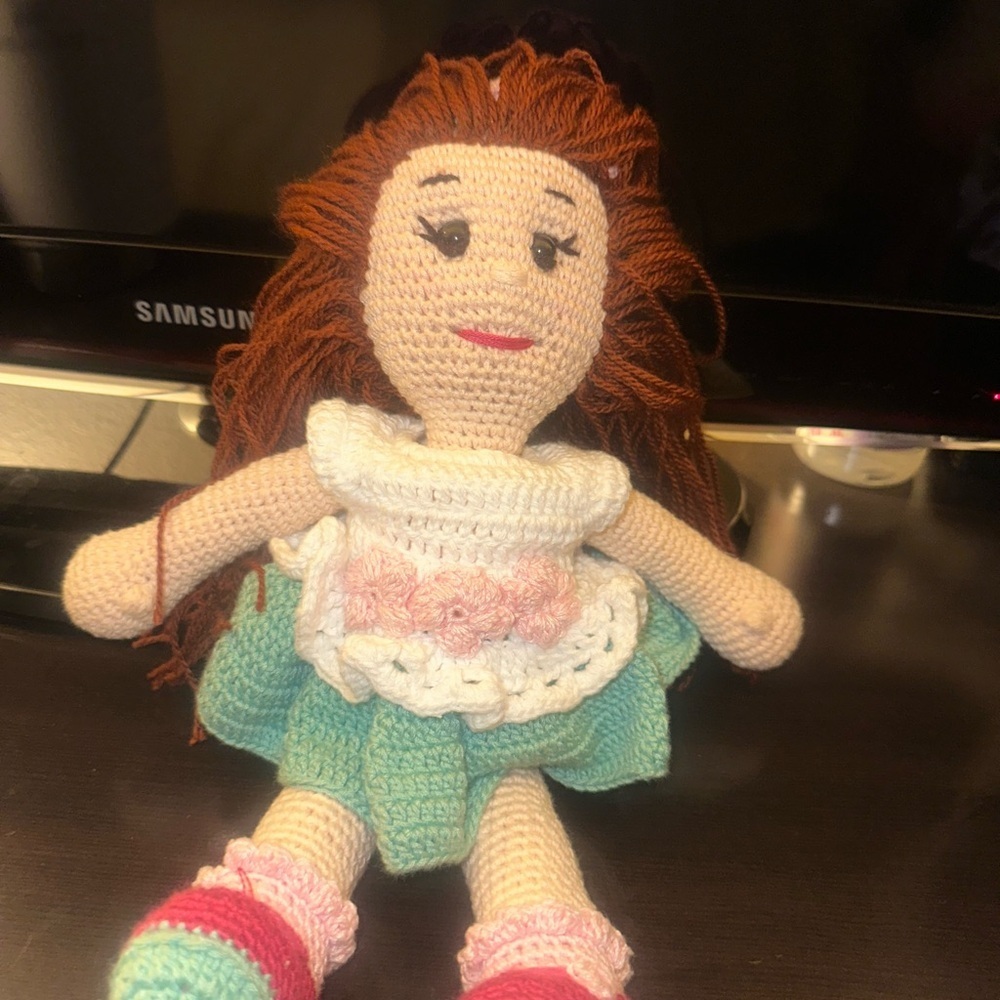 Handcrafted Doll with Brown Hair and Colorful Outfit